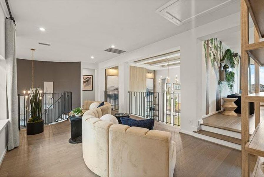 A spacious loft area sits between the bedrooms and game room. Representative image.