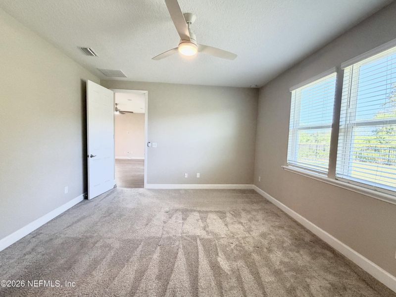 Spacious, unfurnished interior of a new home in Seasons at TrailMark, St. Augustine (Image 67).