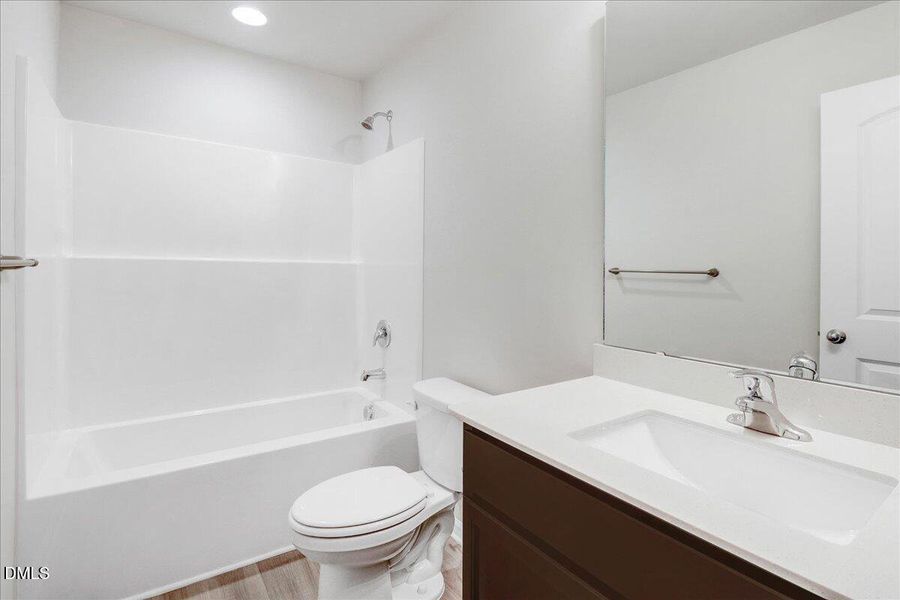 19-Secondary bathroom with tub shower co