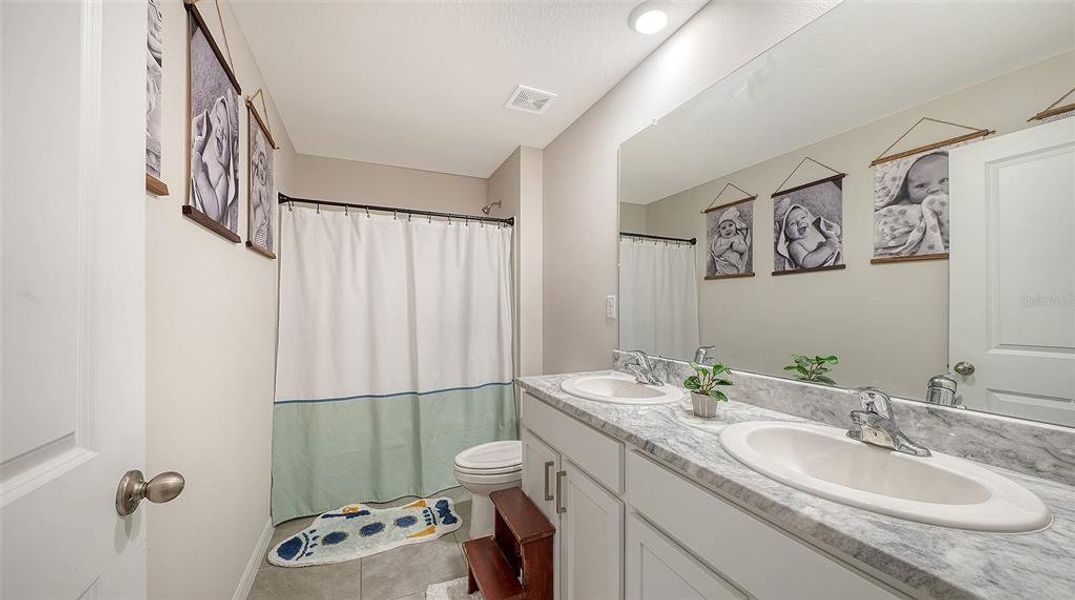 Furnished interior view inside a new home in Bella Lago, Parrish (Image 19).