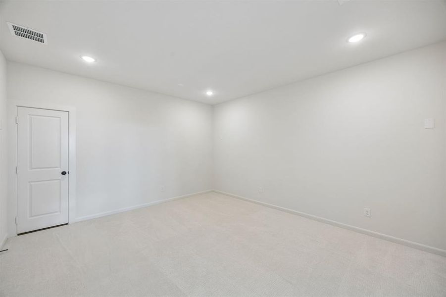 This spacious media room with adjacent game room create the ultimate family entertainment zone!