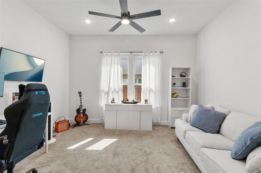 Home office featuring carpet, recessed lighting, and a ceiling fan