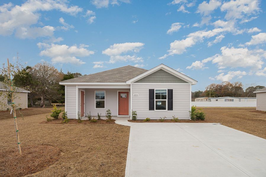 Representative exterior photo of a completed home built from the LEWIS by D.R. Horton in Cottonwood Place, Tabor City, NC (Image 2).