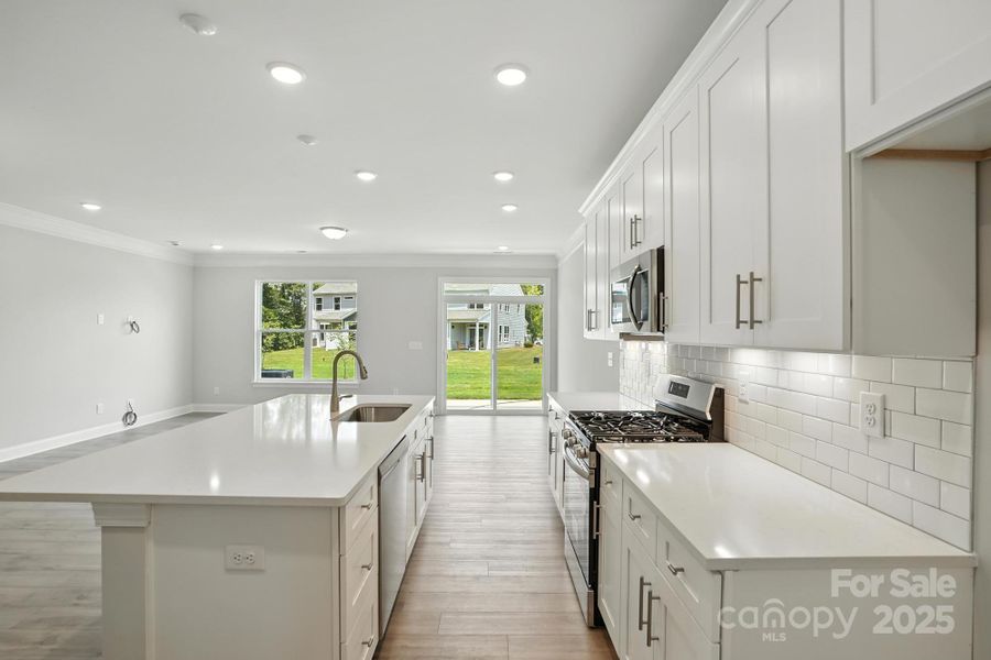 Furnished interior view inside a new home in Harrisburg Village Townhomes, Harrisburg (Image 9).