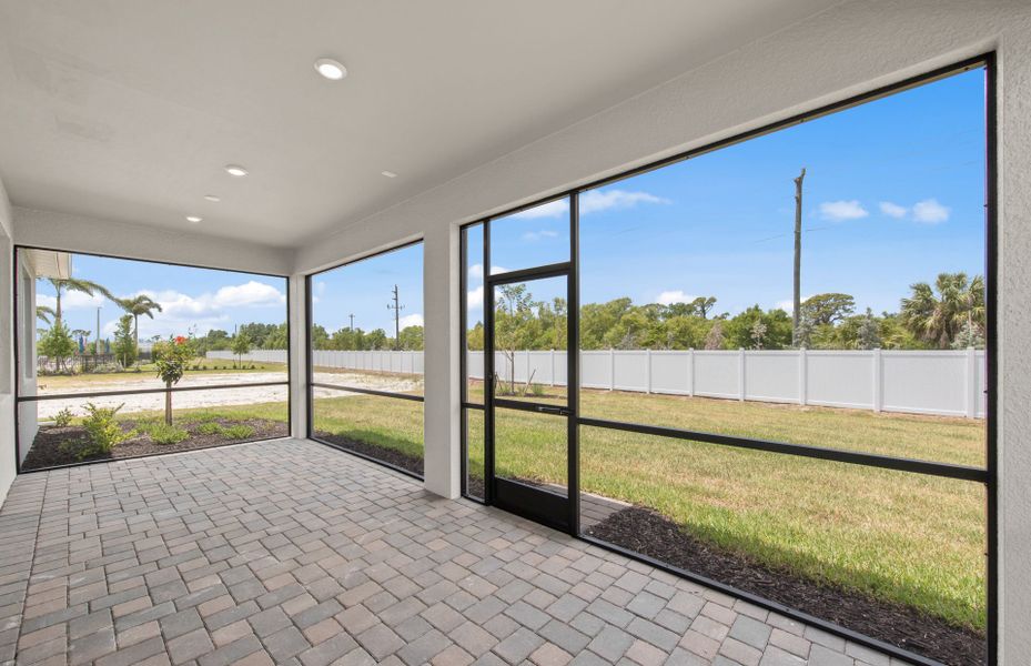 Exterior details and patio area of a home in Shores at Stillwater, Englewood (Image 21).