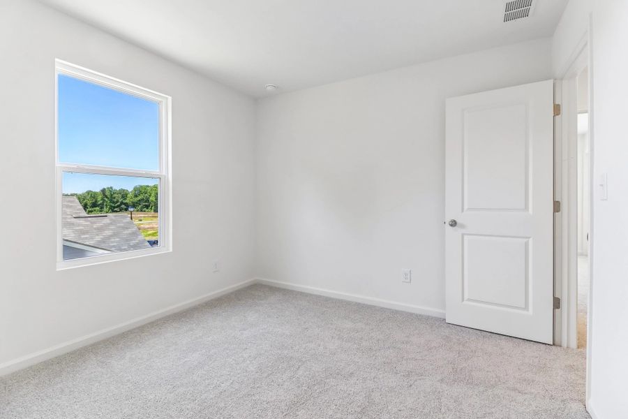 Representative unfurnished interior of a home built from the Copernicus by Starlight Homes in Vida Mar, League City (Image 19). Representative unfurnished interior of a home built from the Copernicus by Starlight Homes in Vida Mar, League City (Image 19).
