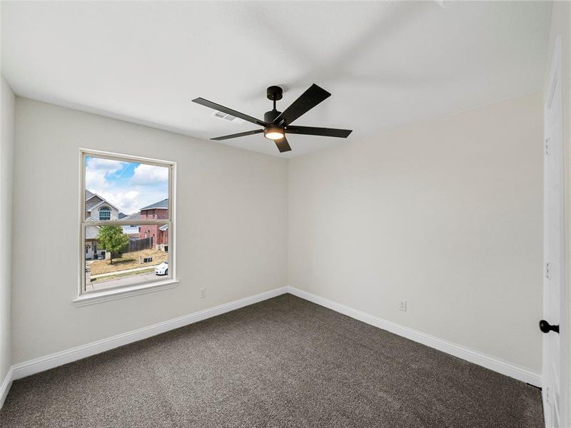 Unfurnished room with carpet flooring and ceiling fan