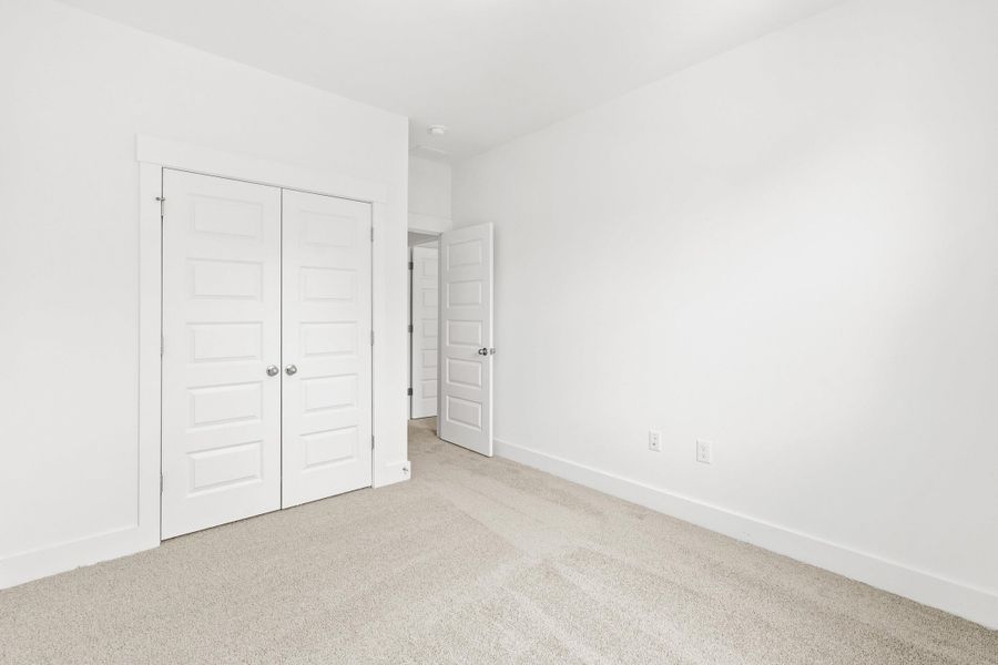 Spacious, unfurnished interior of a new home in Long Bay Golf Club, Longs (Image 35).