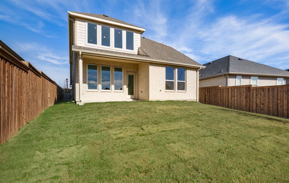 Exterior details and patio area of a home in Reunion, Rhome (Image 20). Exterior details and patio area of a home in Reunion, Rhome (Image 20).