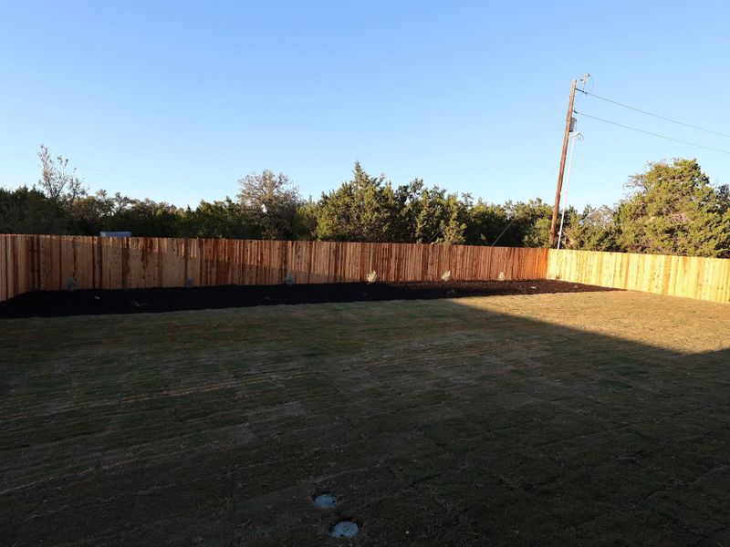 Exterior details and patio area of a home in Edgewood, Leander (Image 13). Exterior details and patio area of a home in Edgewood, Leander (Image 13).