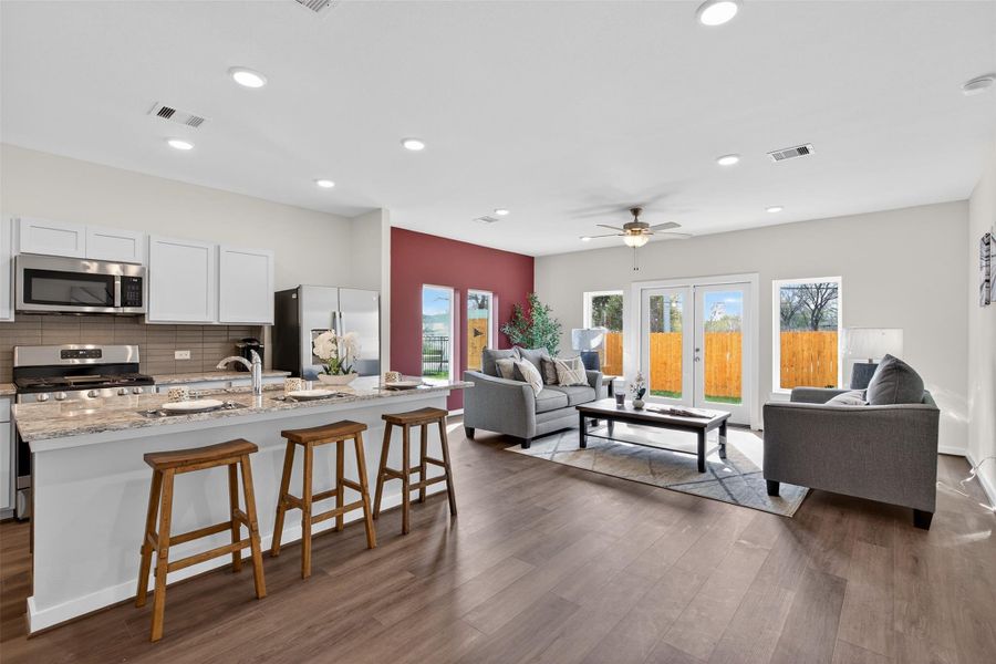 Expansive interior with seamless transitions between living and kitchen areas, enhanced by natural light and an open, modern design. Expansive interior with seamless transitions between living and kitchen areas, enhanced by natural light and an open, modern design.