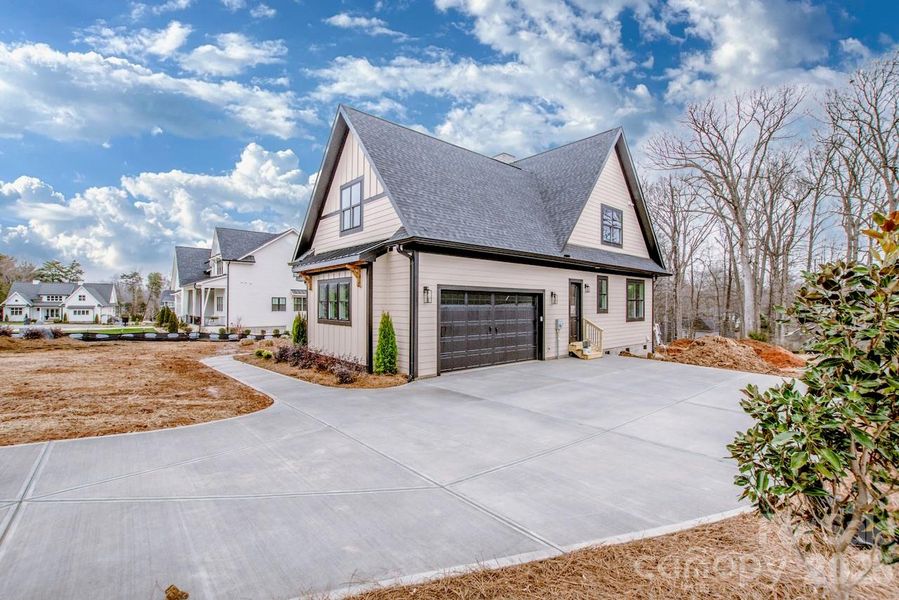 Front exterior of a new home in , Mooresville, NC, highlighting curb appeal (Image 25).