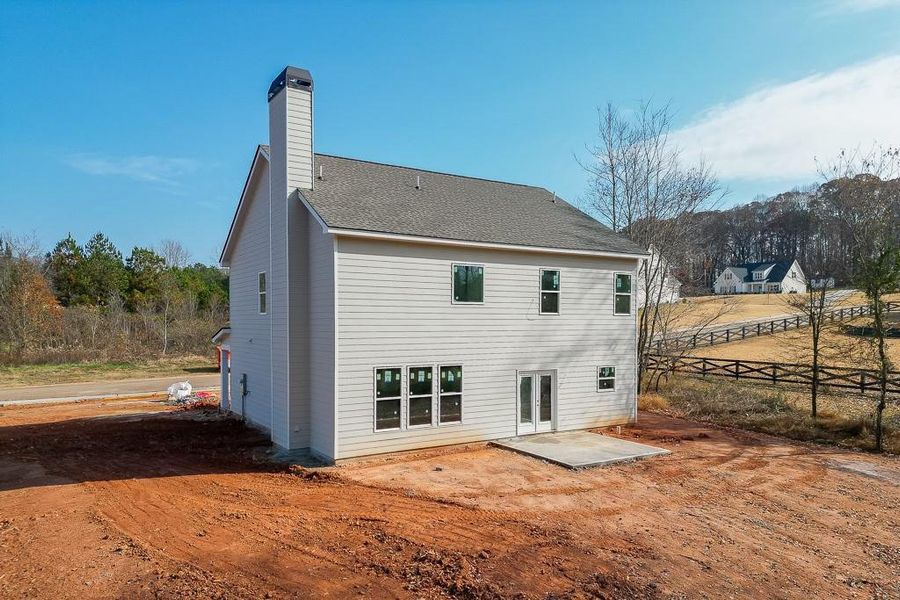 Front exterior of a new home in , Jefferson, GA, highlighting curb appeal (Image 3).