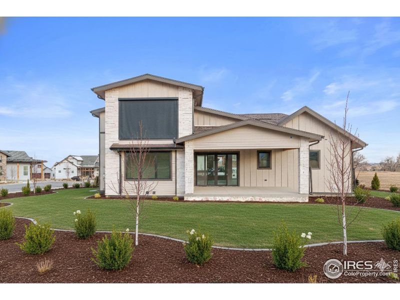 Front exterior of a new home in , Berthoud, CO, highlighting curb appeal (Image 13).