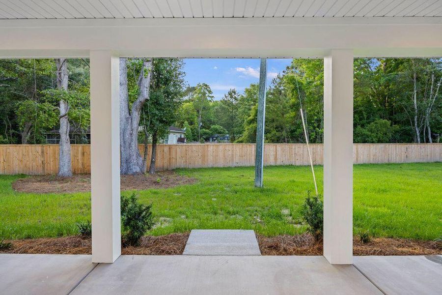 Exterior details and patio area of a home in , Awendaw (Image 36).