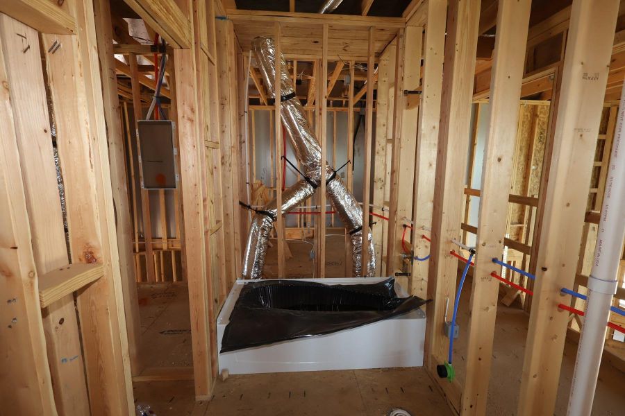 In-progress construction of a new home in Dunham Pointe, Cypress, TX (Image 31).