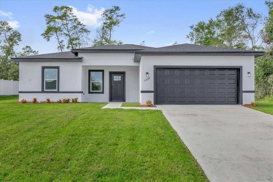 Front exterior of a new home in , Ocala, FL, highlighting curb appeal (Image 21).