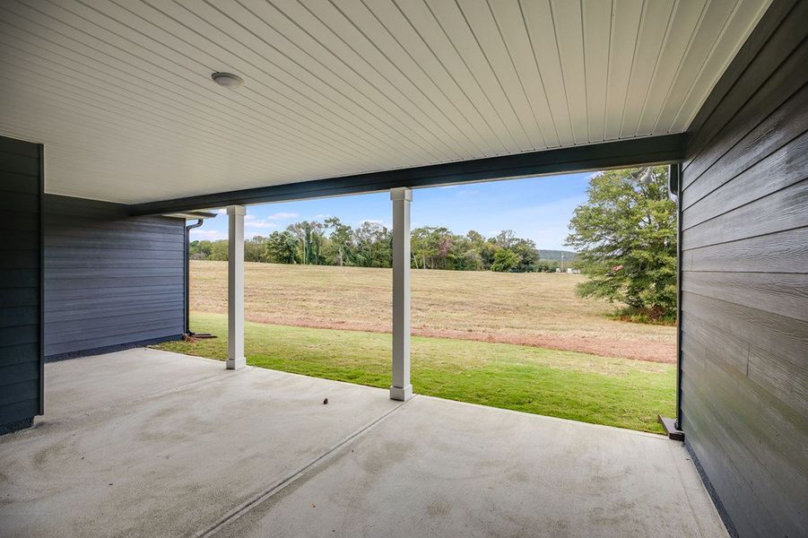 Exterior details and patio area of a home in Parmer Farms, Roopville (Image 3).