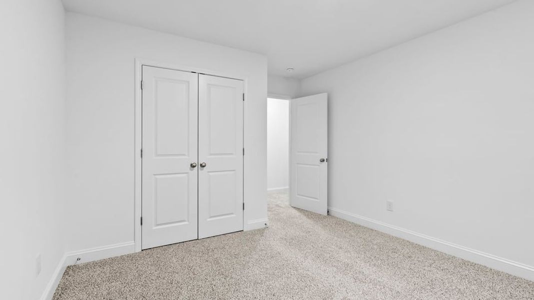 Representative unfurnished interior of a home built from the End Unit by D.R. Horton in Pearson Road Townhomes, Easley (Image 24).
