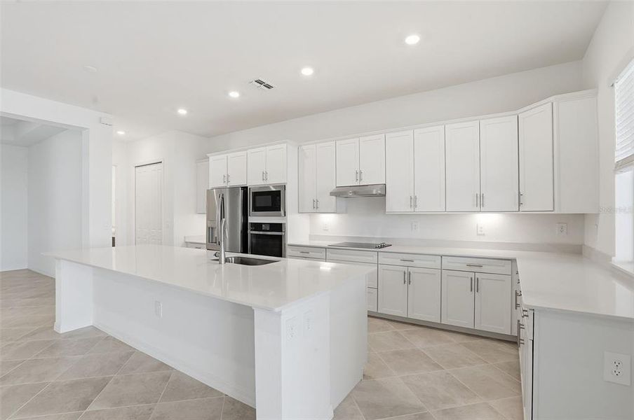 Furnished interior view inside a new home in Wellen Park Golf & Country Club, Venice (Image 5).