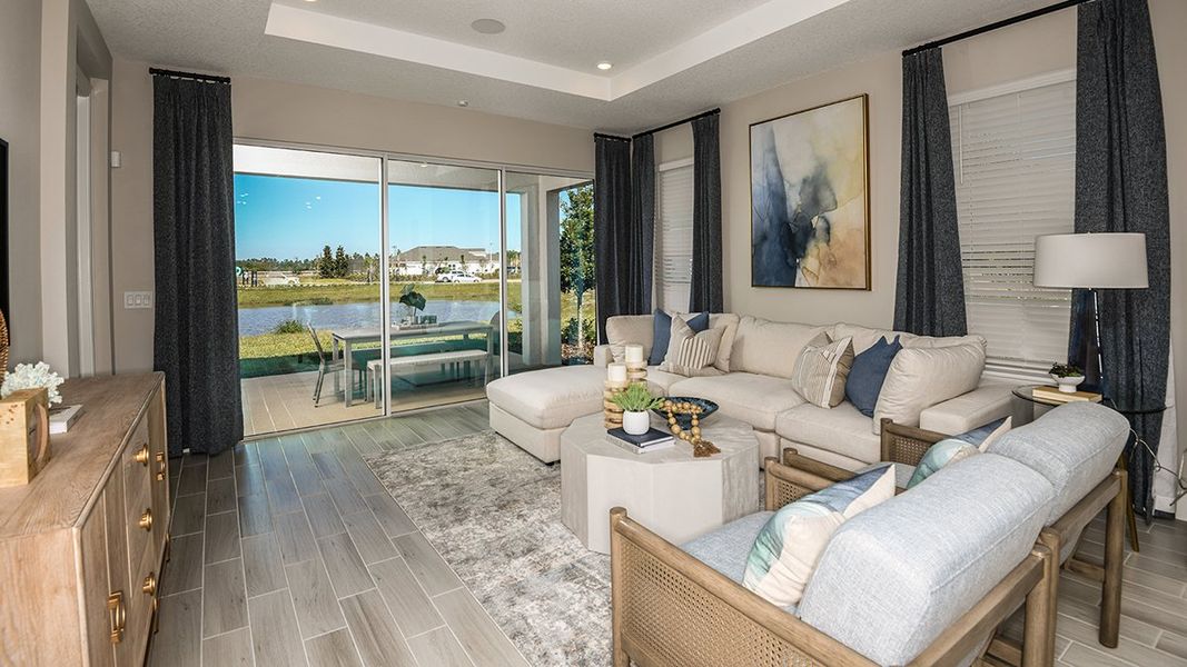 Furnished interior view inside a new home in Esplanade at Kingston, Estero (Image 6).