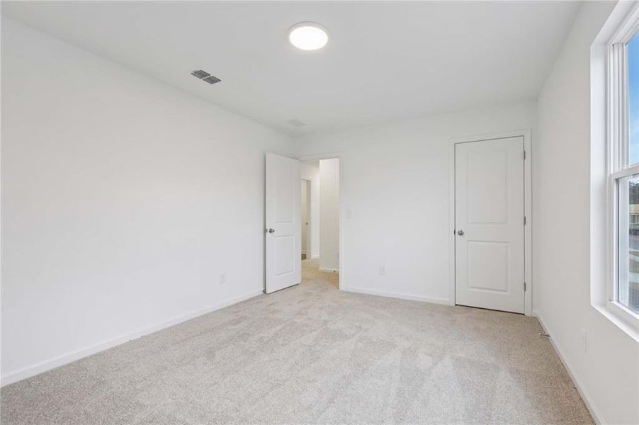 Spacious, unfurnished interior of a new home in The Pointe at Heron Bay, Locust Grove (Image 28).