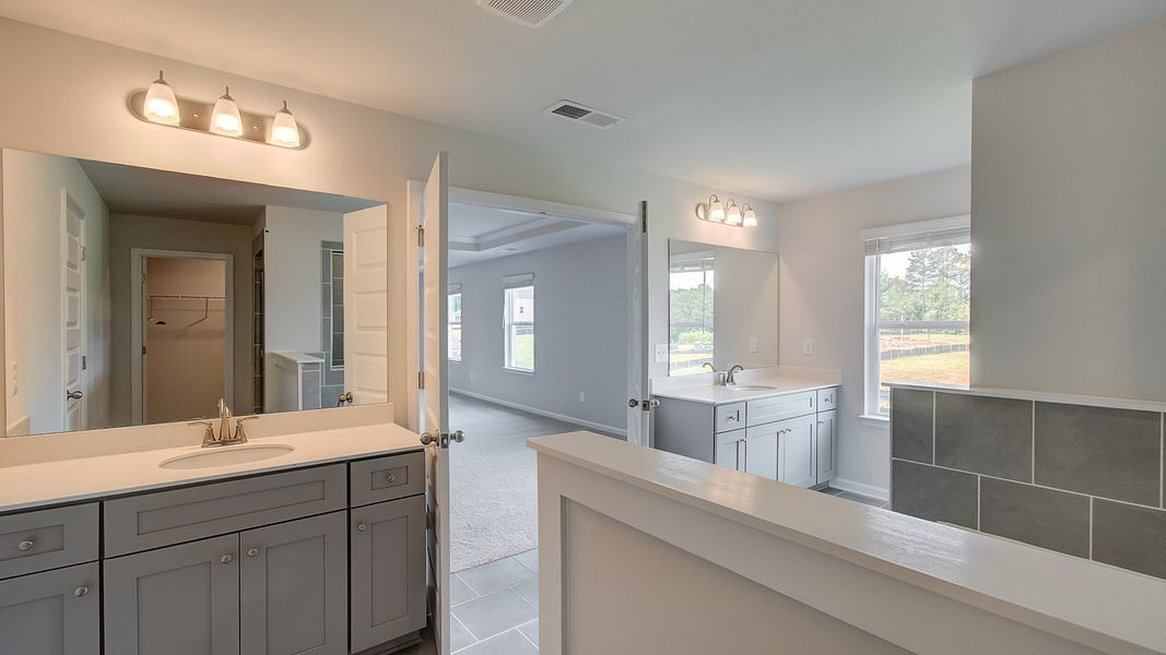 Furnished interior view inside a new home in Westwind Estates, Hampton (Image 29).