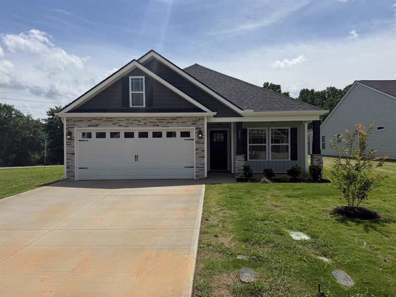 Front exterior of a new home in Stones Throw, Inman, SC, highlighting curb appeal (Image 1). Front exterior of a new home in Stones Throw, Inman, SC, highlighting curb appeal (Image 1).