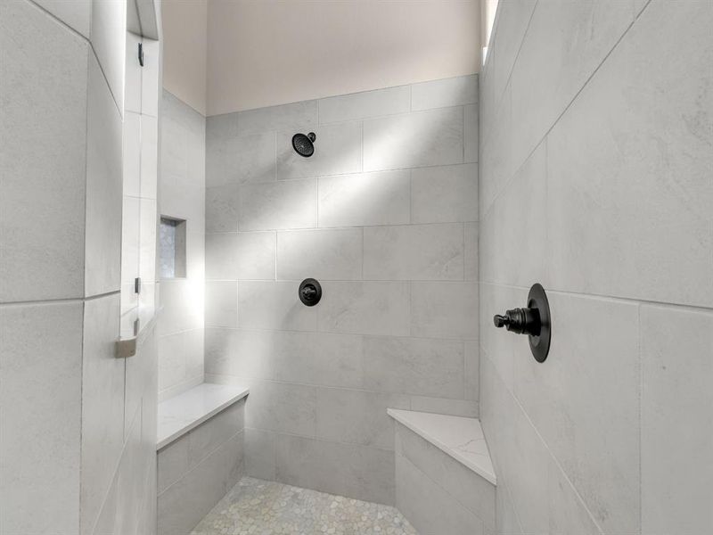 Bathroom with tiled shower