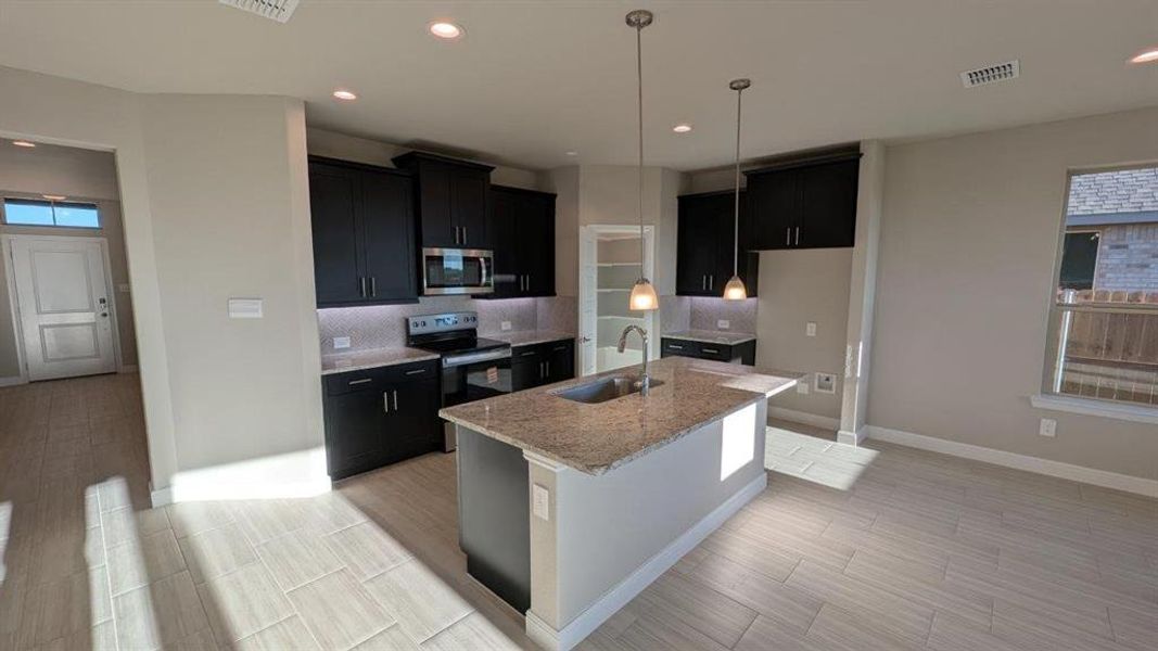 Kitchen - All Home and community information, including pricing, included features, terms, availability and amenities, are subject to change at any time without notice or obligation. All Drawings, pictures, photographs, video, square footages, floor plans, elevations, features, colors and sizes are approximate for illustration purposes only and will vary from the homes as built. Kitchen - All Home and community information, including pricing, included features, terms, availability and amenities, are subject to change at any time without notice or obligation. All Drawings, pictures, photographs, video, square footages, floor plans, elevations, features, colors and sizes are approximate for illustration purposes only and will vary from the homes as built.