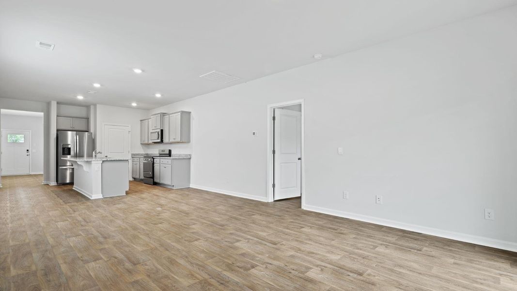 Spacious, unfurnished interior of a new home in Pine Hills at Cane Bay, Summerville (Image 8). Spacious, unfurnished interior of a new home in Pine Hills at Cane Bay, Summerville (Image 8).