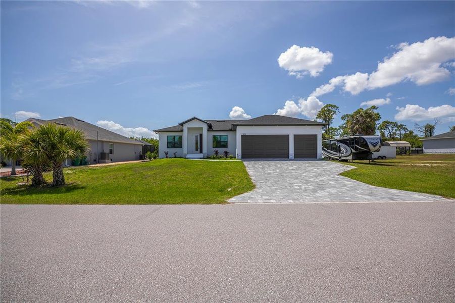Front exterior of a new home in , Port Charlotte, FL, highlighting curb appeal (Image 30).