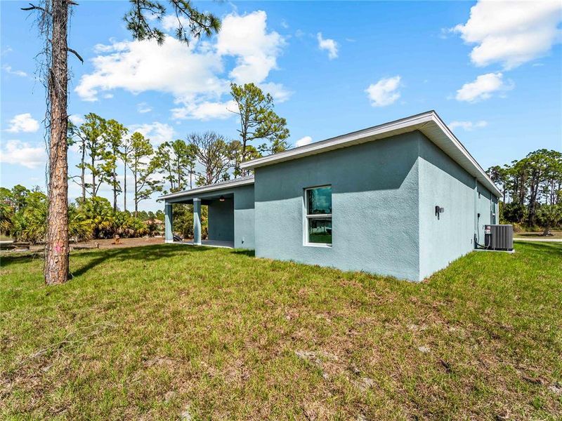 Exterior details and patio area of a home in , North Port (Image 21).