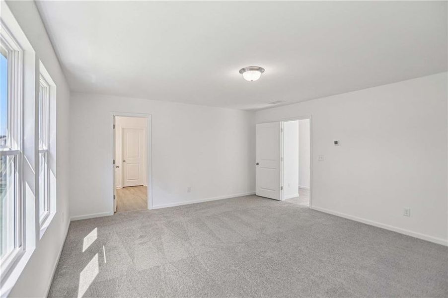 Spacious, unfurnished interior of a new home in The Pointe at Heron Bay, Locust Grove (Image 29).