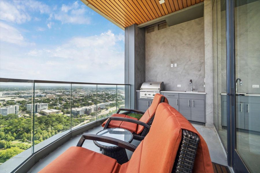 The view from the patio looking north.  The gas grill and sink are ready for your next cookout.