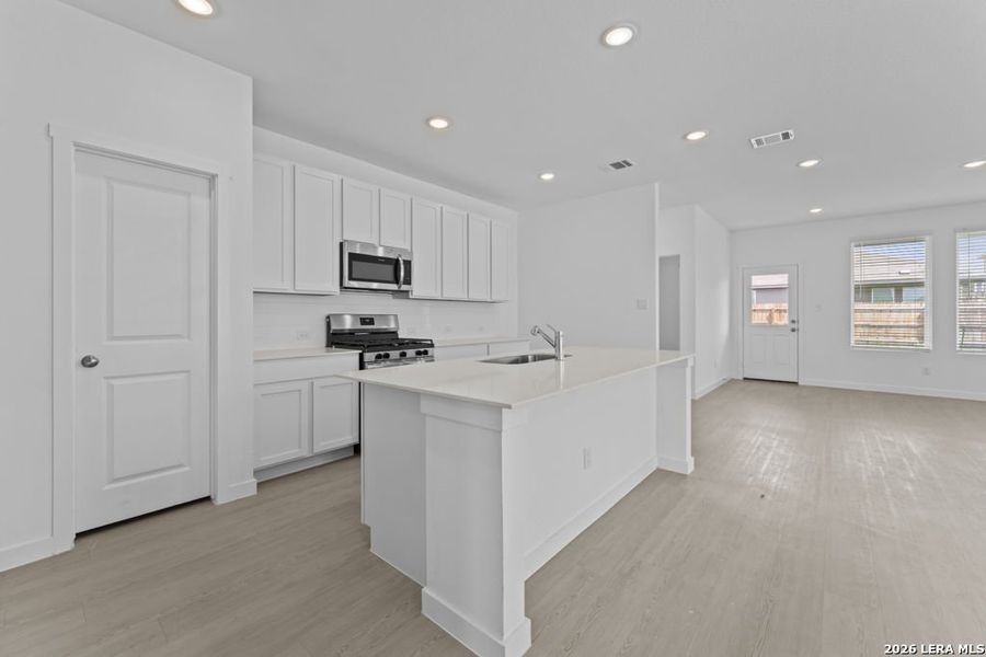 Furnished interior view inside a new home in Espada, San Antonio (Image 11).
