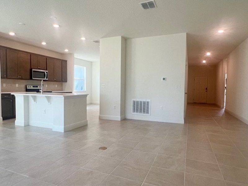 Spacious, unfurnished interior of a new home in Lakes At St Sebastian, Micco (Image 12).