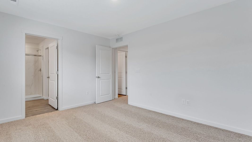 Representative unfurnished interior of a home built from the Juniper by D.R. Horton in Ellston Park, Colorado Springs (Image 24).