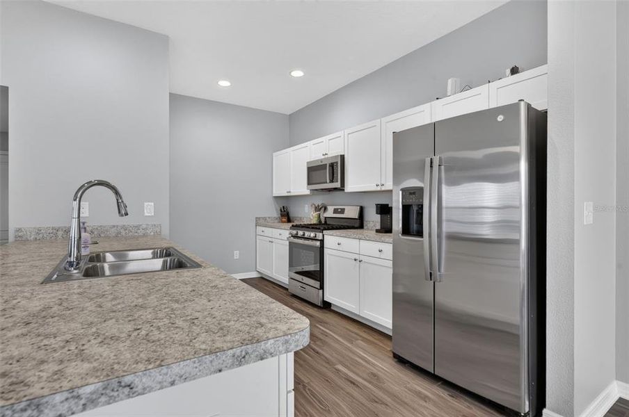 Furnished interior view inside a new home in , The Villages (Image 14).