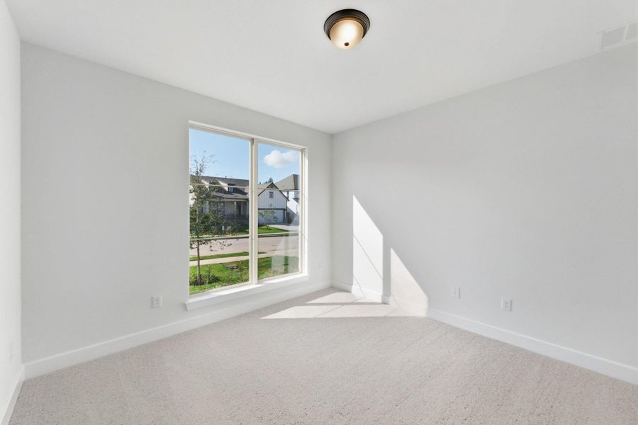 Spacious, unfurnished interior of a new home in The Colony, Bastrop (Image 22).