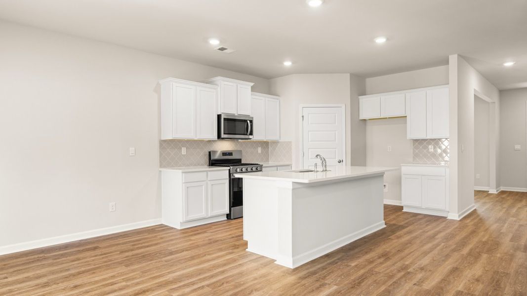Representative furnished interior of a home built from the Elle by D.R. Horton in Preserve at Dove Creek, Statham (Image 5).