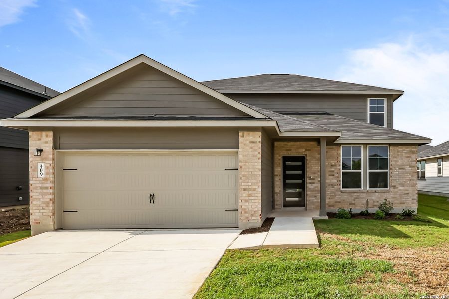 Front exterior of a new home in Hannah Heights, Seguin, TX, highlighting curb appeal (Image 2). Front exterior of a new home in Hannah Heights, Seguin, TX, highlighting curb appeal (Image 2).
