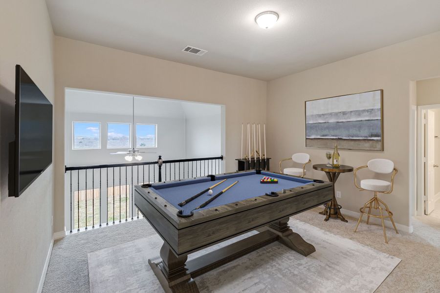 Game room. Note: Sample product photo - actual exterior and interior selections may vary by homesite