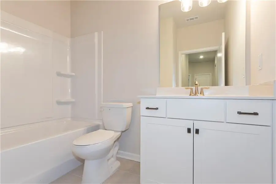 Furnished interior view inside a new home in Creekwood, Powder Springs (Image 7). Furnished interior view inside a new home in Creekwood, Powder Springs (Image 7).