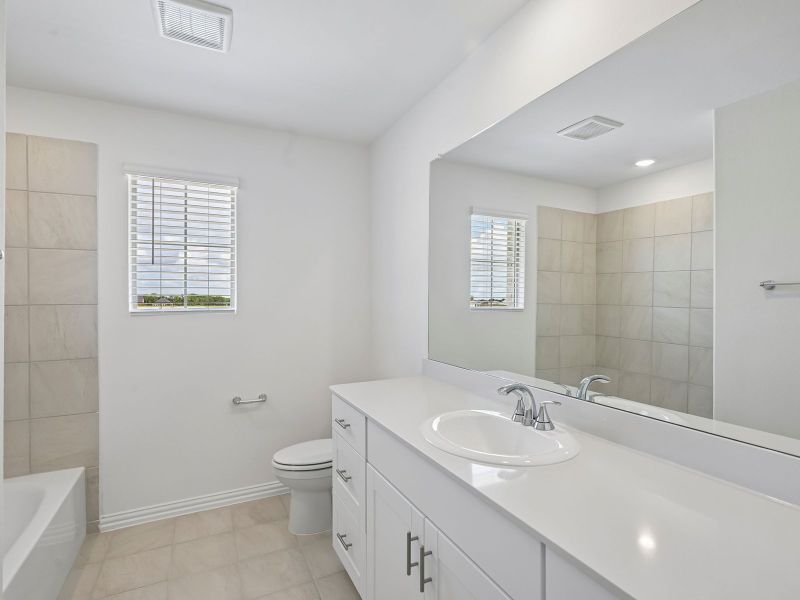 Furnished interior view inside a new home in Parks at Foster Crossing - Spring Series, Anna (Image 9).