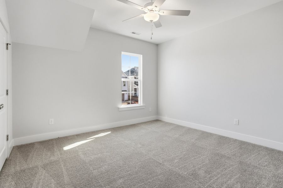 Spacious, unfurnished interior of a new home in Sweetbrier, Durham (Image 29).
