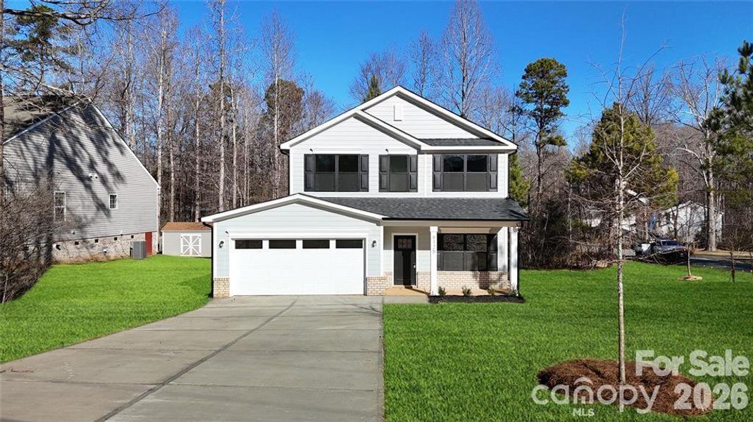 Front exterior of a new home in , Charlotte, NC, highlighting curb appeal (Image 1). Front exterior of a new home in , Charlotte, NC, highlighting curb appeal (Image 1).