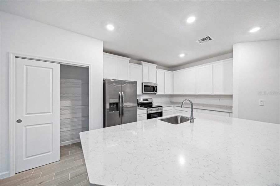 Furnished interior view inside a new home in Grand Park North, Dunnellon (Image 14).