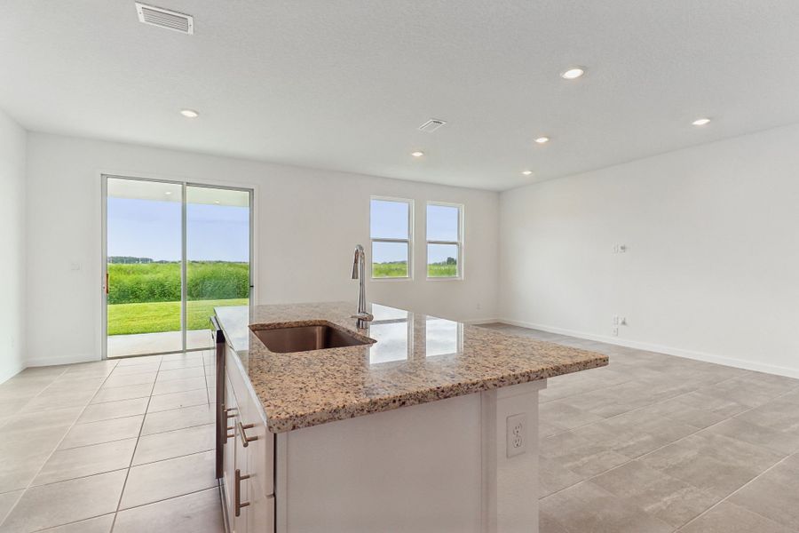 Kitchen of the Bluebell plan in Lakes at Bella Lago.