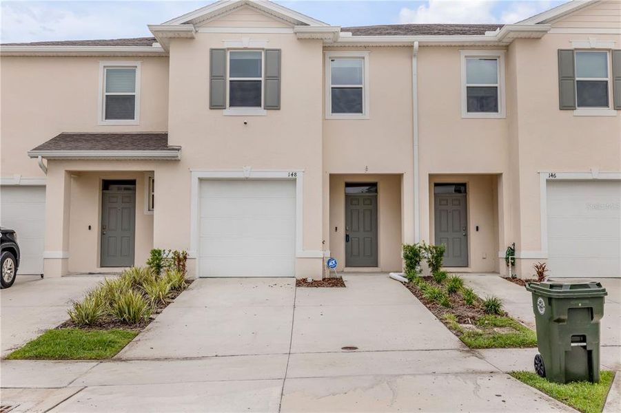 Front exterior of a new home in , Daytona Beach, FL, highlighting curb appeal (Image 1). Front exterior of a new home in , Daytona Beach, FL, highlighting curb appeal (Image 1).